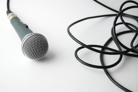 dynamic microphone with cable on white backgroundの写真素材