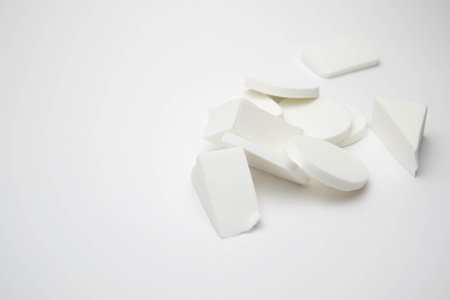 make up sponge pile on white background