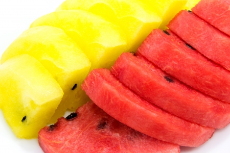 Slice of red and yellow watermelonの写真素材