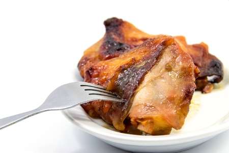 grilled chicken on a white plateの写真素材