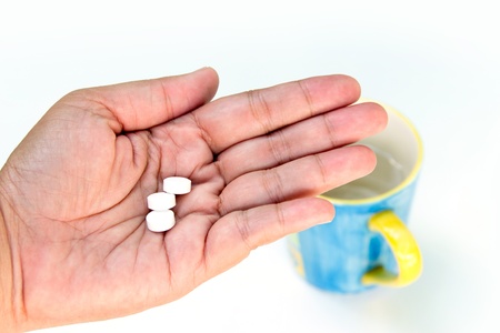 Hand with medicine pillsの写真素材