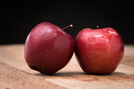 red apple on woodenの写真素材