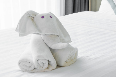 Towels in elephants shape on white  bed Comfortable softの写真素材