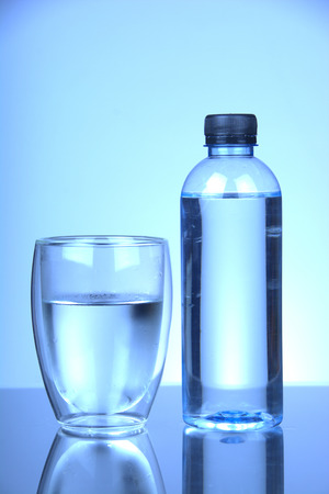 glasses and bottles of water.Health care conceptの写真素材