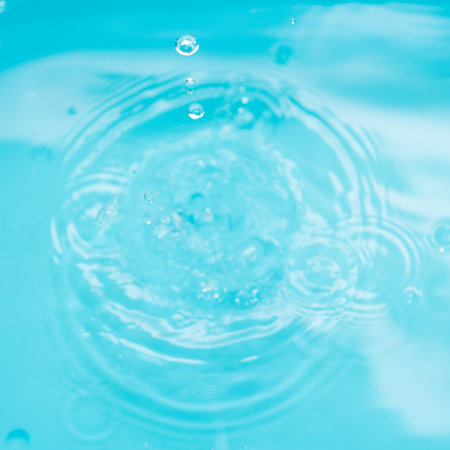 Crystal clear, turquoise water square background using for beauty, cosmetics and transquil design.の写真素材