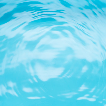 Crystal clear, turquoise water square background using for beauty, cosmetics and transquil design.の写真素材