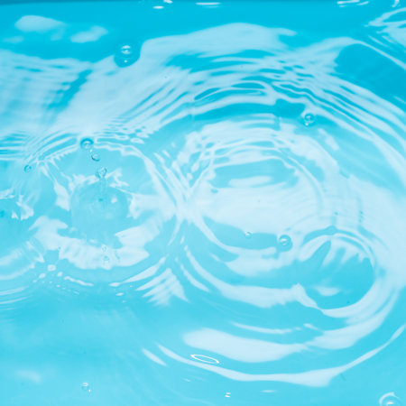 Crystal clear, turquoise water square background using for beauty, cosmetics and transquil design.の写真素材
