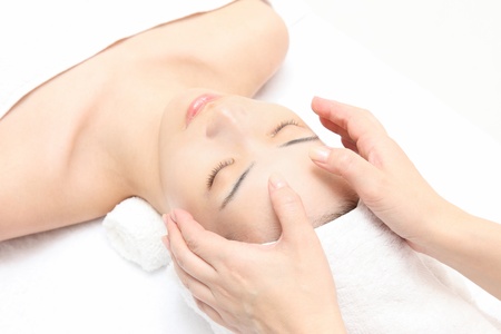 Young Asian woman to head massageの写真素材