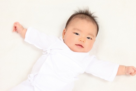 Asian baby boy white backgroundの写真素材