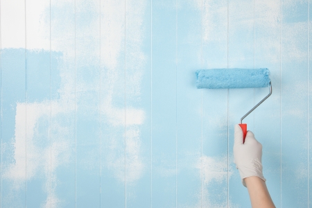 Painting a wall in blueの写真素材