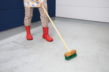 Woman cleaning the floorの写真素材