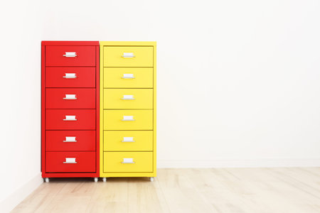 Stack of plastic storage drawer for home or office use on white background