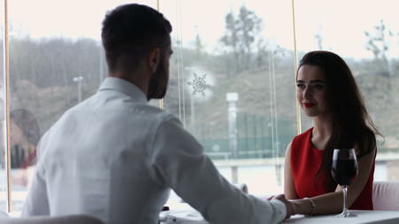 Middle age couple at the restaurant. couple interacting at lunch in a fancy restaurantの写真素材
