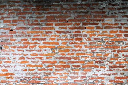 An old brick wall of red color. Background of red bricks. Brick wall texture. Perfect background...