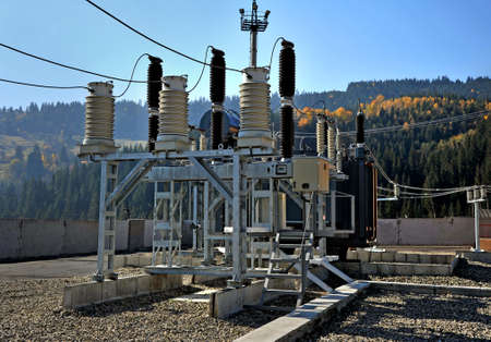 Part of high-voltage substation with switches and dis connectors.High voltage converter at a power plantの写真素材