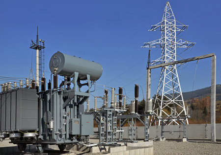 High voltage oil-filled power transformer on electrical substation.Part of high-voltage substation...