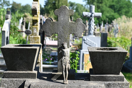 Crucifixion of Jesus Christ on the cross. Tombstone in the cemetery.