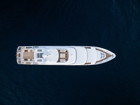 large private super motor yacht underway in the ocean