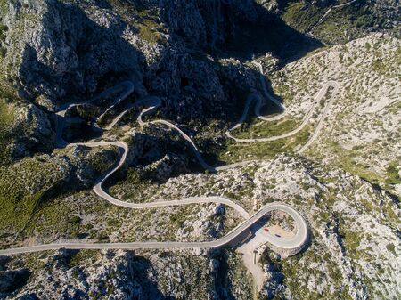 Mountain curvy roadAerial view of Sa Calobra road, in the Tramuntana Mountains, in Majorcaの写真素材