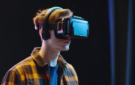 Young man embraces VR headset for futuristic experience.