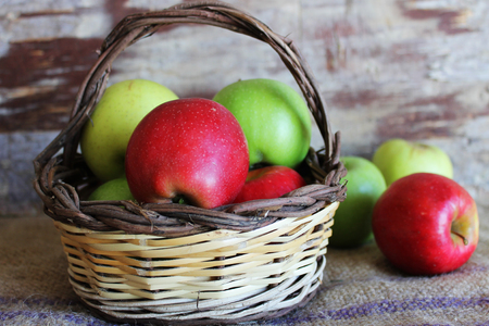 Organic apples in basketの写真素材