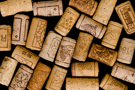 Winke corks over black background