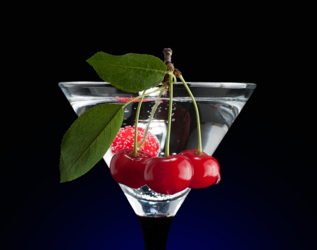 Cherries in a martini glass. Clipping pathの写真素材