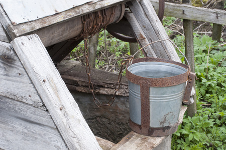 Old well for water on a cemeteryの写真素材