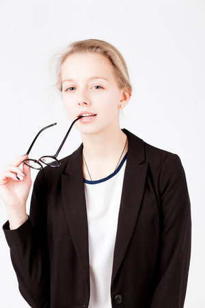 Pretty woman hold glasses on white backgroundの写真素材