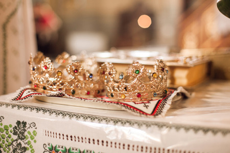 Closeup image of church weddings crowns on table backgroundの写真素材