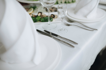 Silver table cutlery elegant decorated for celebration outdoorの写真素材
