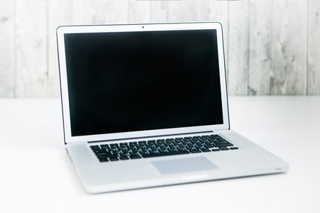 Notebook on light background. Laptop