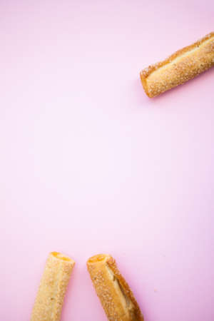 Cookies on the pink background with copy space for textの写真素材