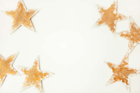 Gold stars on white background. Christmas star. Copy space for textの写真素材
