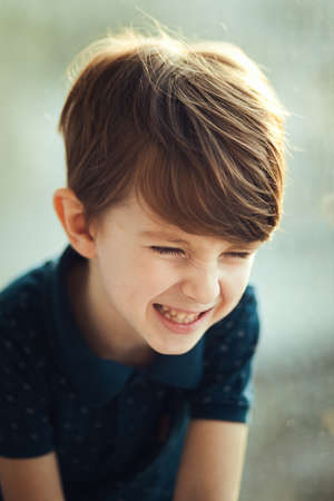 Portrait of the laughing boy. Toddler, close up portrait.の写真素材