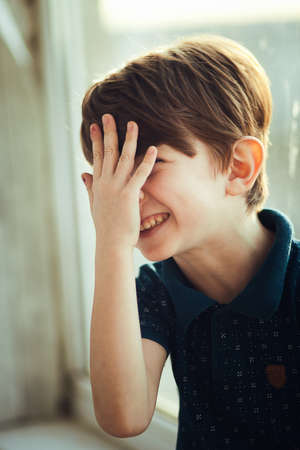 Portrait of the laughing boy. Toddler, close up portrait.の写真素材
