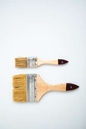 Two paintbrushes on white background with copy space.の写真素材