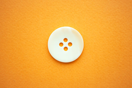 One big white button on yellow background, copy space.