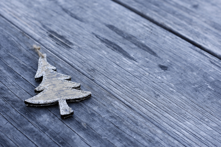 Tree shape ornament on the wooden backgroundの写真素材