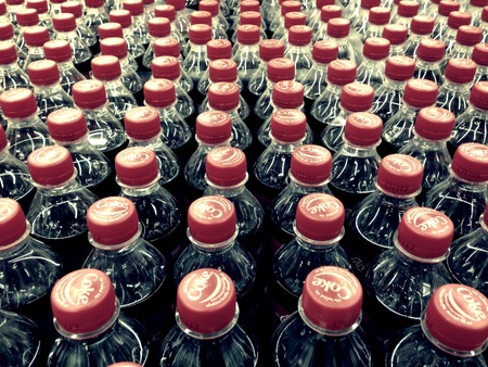 Lot of Coca-cola bottles from the top viewの素材