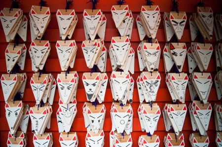 Kyoto, Japan - April 04, 2011: Fox shaped praying cards at Fushimi Inari shrine on April 04, 2011 in Kyoto, Japan. Fushimi Inari shrine is one of the most popular shinto shrines in Kyoto.のeditorial素材