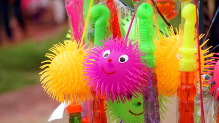 Toys for sale in the city streets. Beautiful baby toys made of rubber. The picture will come alive.