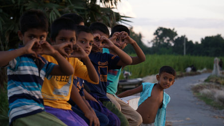 Village children in Bangladesh. Children are playing on the banks of the river.のeditorial素材