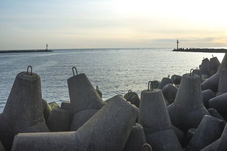 gates to the sea breakwater moleの写真素材