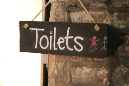 toilet signs hung at christ cathedral church in Irelandの写真素材