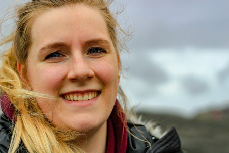 Young women, 18 to 25 years old poses for a portrait photo in Iceland. Room for copy space.