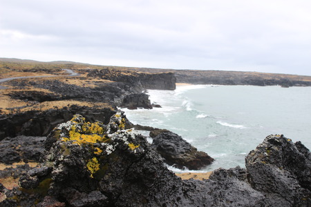 snaefellsnes peninsula in the Western coast of iceland, known for its basalt rocks and impressive landscape. This was photographed in a rainy cloudy day.の写真素材