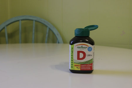 London, Canada - January 01 2019: Editorial illustrative photograph of a jar of Jameison Vitamin D3 tablets. Vitamin d is a popular vitamin for Canadians.のeditorial素材