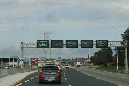 October 06 2019: Sarnia Canada/Port Huron US border: Editorial photo of Cars line up at the border...