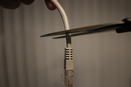 Concept Isolated Photo Of Cutting Cable Cord.